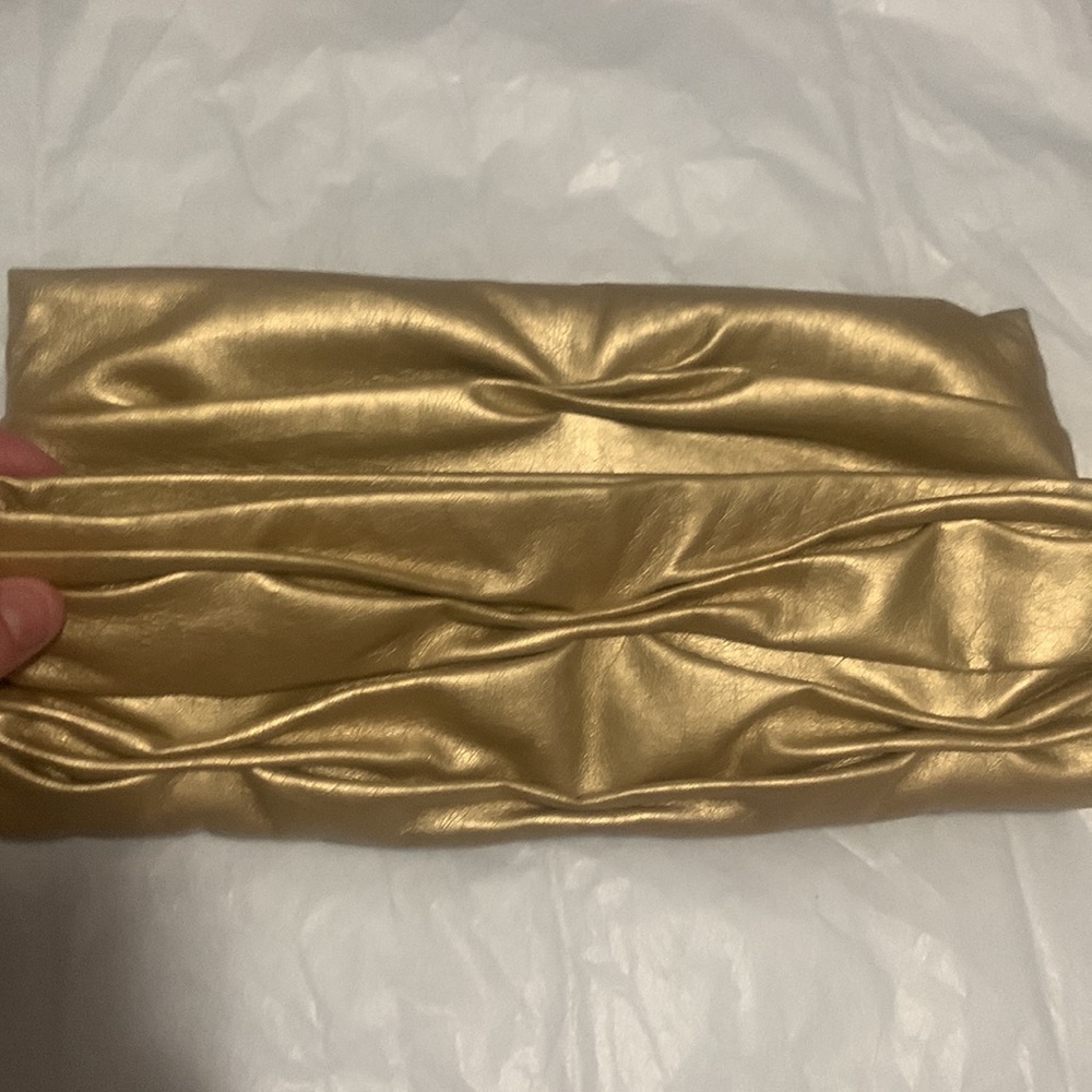Roberto Vanini Gold clutch folds in half magnetic close with two snaps c…